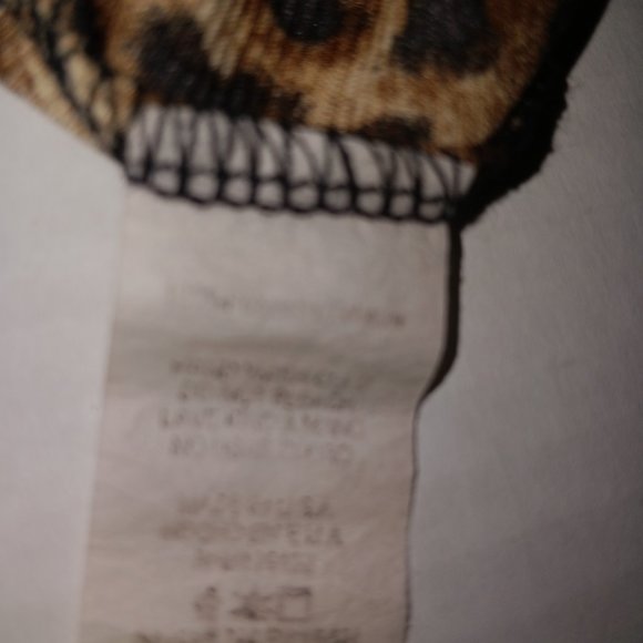 FASHION NOVA SHEER FLARE LEG ANIMAL PRINT PANTS - Picture 14 of 16